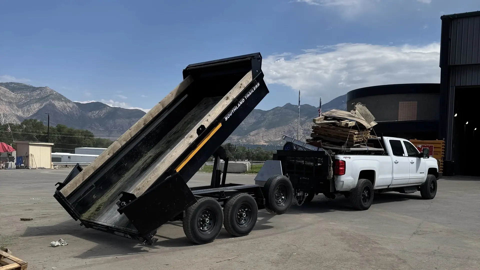 truck with dumping trailer at the dumps